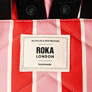 roka-canfield-b-small-recycled-canvas-backpack---seaside-stripe-redpink-35910527