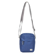 roka-bond-small-recycled-canvas-crossbody-bag---dark-denim-pinstripe-blue-34459955